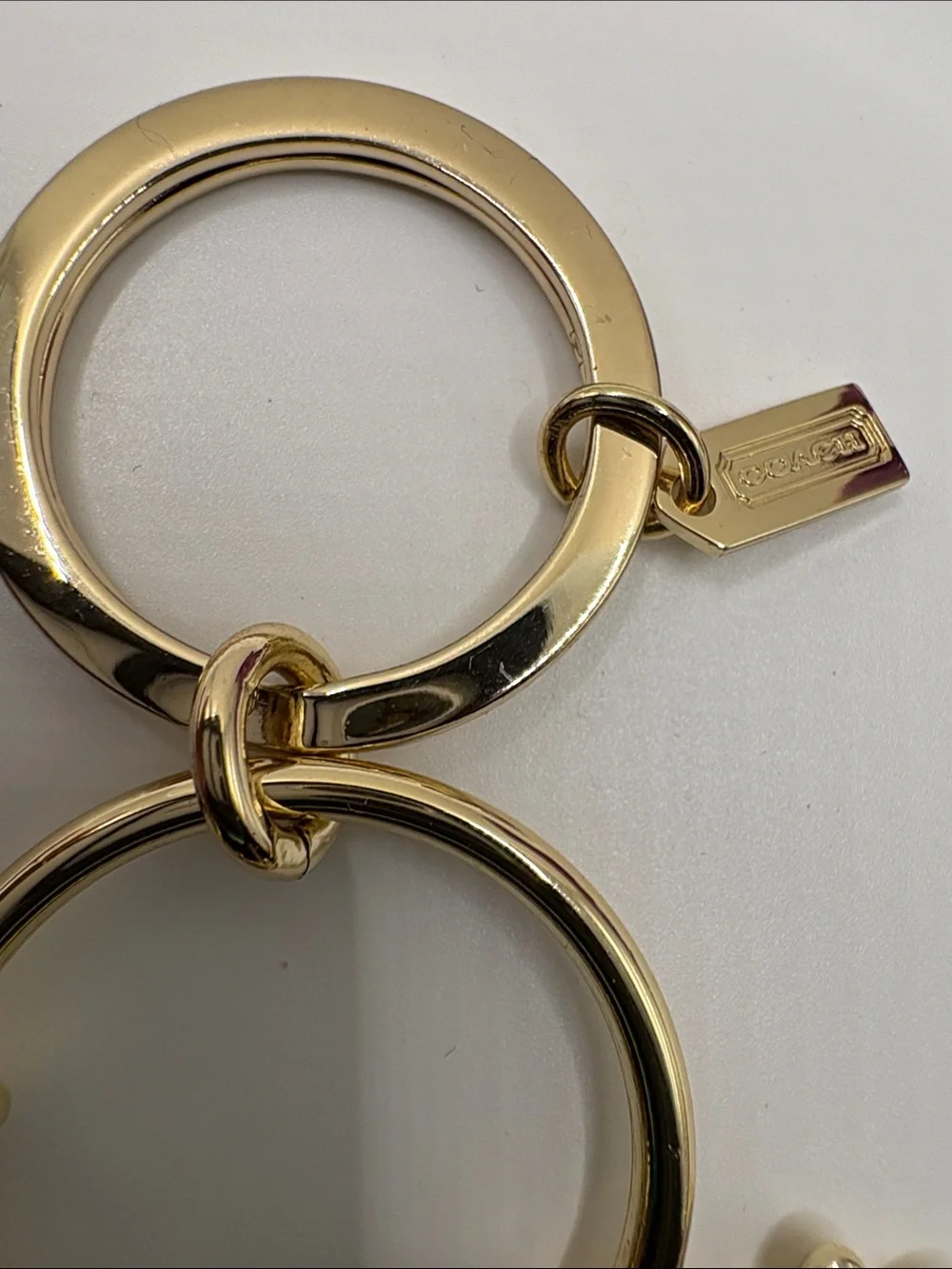 Coach Gold Daisy Charm Keyring with Cream Enamel Flowers
